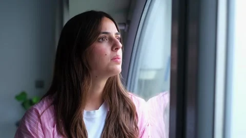 Young Woman Feels Concerned While Browsing Her Stock Footage 332685441