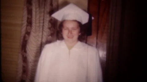 young woman in graduation cap and gown Stock Video Pond5