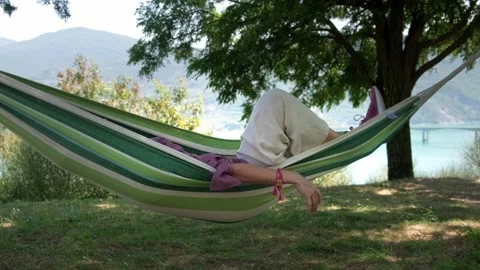 Young woman on hammock. Stock Footage 202049352