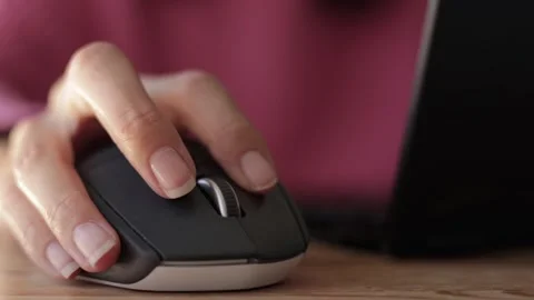 Young Woman Hand Using Computer Mouse While Working on Laptop Close Up Stock Footage 331925975