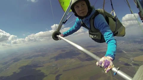 Young woman handle her hang glider Stock Footage