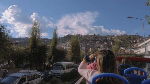 Young Woman having excursion on open touristic bus Stock Footage 91399617