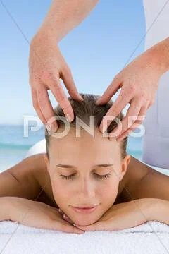 Young Woman Having Head Massaged