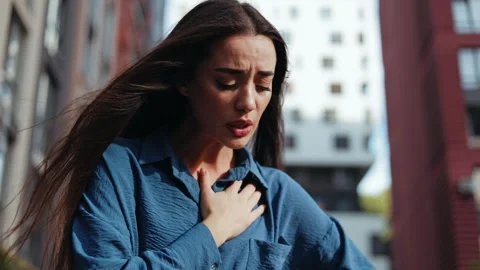 Young Woman Having Panic Attack in City Stock Footage 278234976