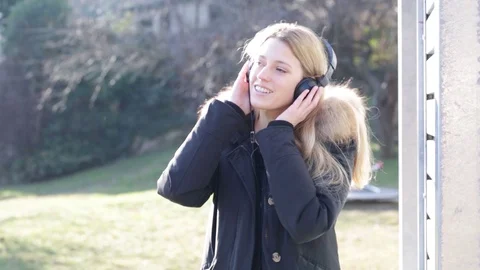 Young  woman in headphones Stock Footage 102468053