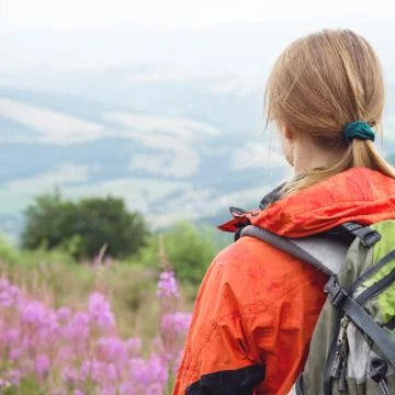 Young woman hiking in the mountains Stock Photos