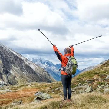 Young woman hiking in the mountains Stock Photos