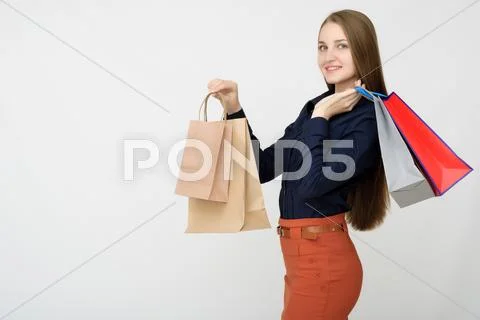 Young Woman hold with shopping bag Stock Photos