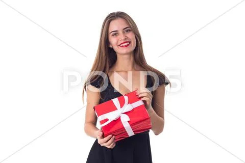 Young woman holding a present Stock Photos