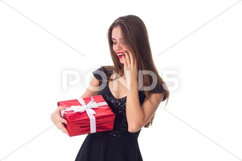 Young woman holding a present Stock Photos