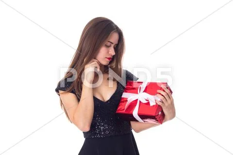 Young woman holding a present Stock Photos