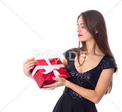 Young woman holding a present Stock Photos
