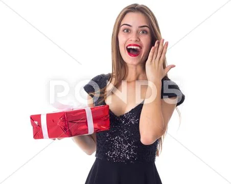 Young woman holding a present Stock Photos