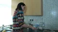 Young woman at home making tea HD Footage