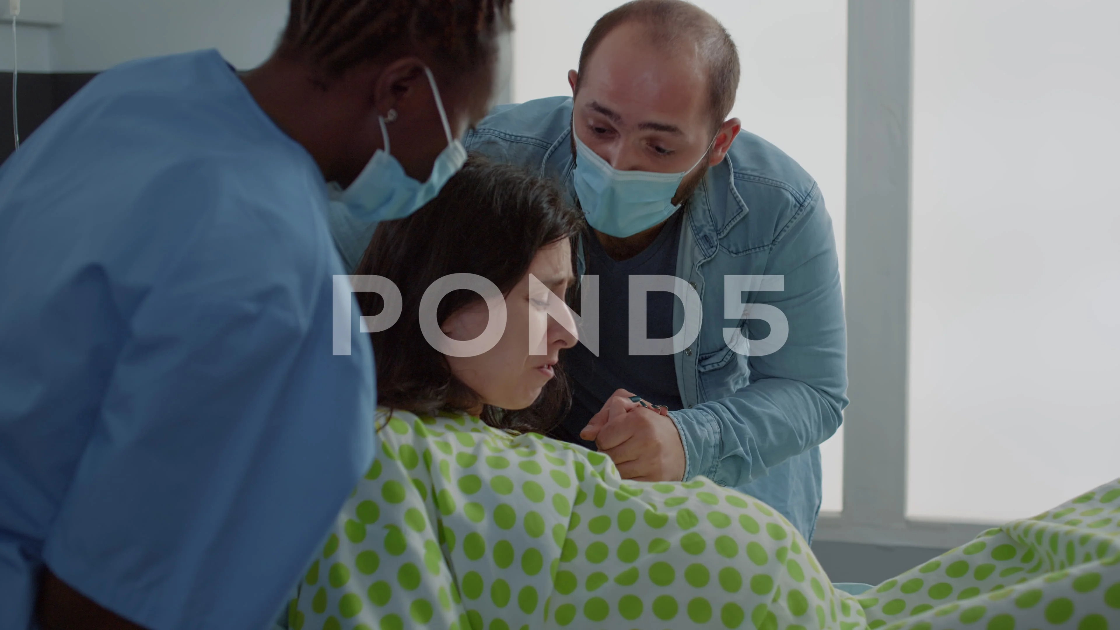 Pregnant Women In Labor Giving Birth