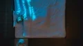 The young woman lay on the bad and take phone. Evening night time. Time lapse 4k or 4k+ Resolution