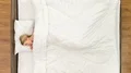 The young woman lay on the bad. Time lapse 4k or 4k+ Resolution