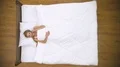 The young woman lay on the bed and phone. View from above 4k or 4k+ Resolution