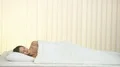 The young woman lay on the bed 4k or 4k+ Resolution