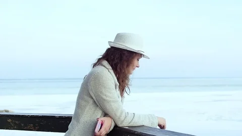 The young woman at the lighthouse. developing hair.slow motion Stock-Footage 75446074