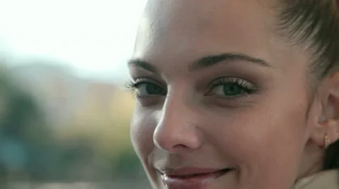 Young woman looking at camera Stock Footage 22007782