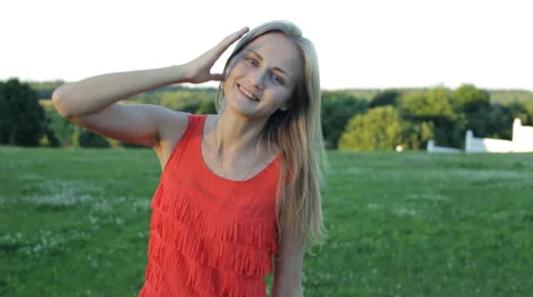 Young woman looking to camera Stock-Footage 64673391