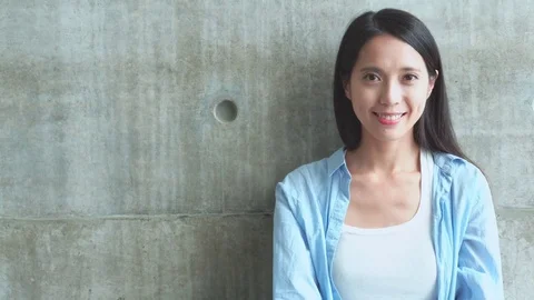 Young woman looking at camera Stock Footage
