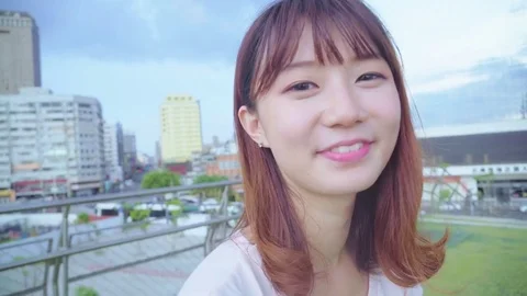 Young woman looking at camera Stock Footage