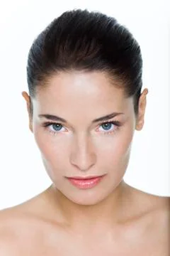 Young woman looking at camera Stock Photos