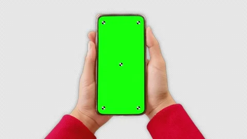 Young woman lying on couch using smartphone with green mock up screen chroma key Stock Footage 306171342