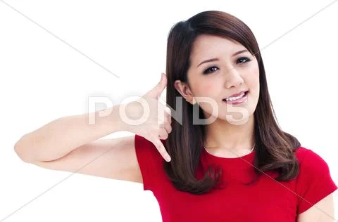 Young Woman Making Call Me Gesture Stock Photos