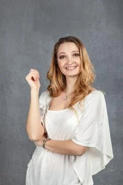 Young woman making faces in studio Stock Photos
