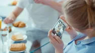 Young Woman Making Photo Of Her Breakfast For Social Media. Stock Footage