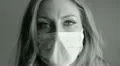 Young woman with medical mask. Black and white. HD Footage