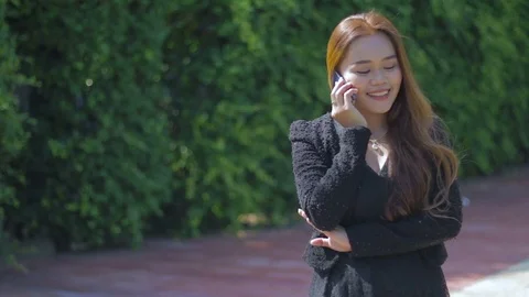 Young woman with modern business Talking on the phone Stock Footage