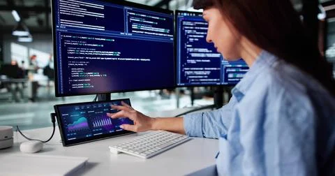 Young Woman Multitasking On Computer, Analyzing Data For Marketing Dashboard. Stock Photos