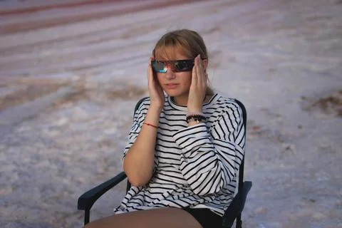 Young woman observing a solar eclipse through specialized glasses, prioriti.. Stock Photos