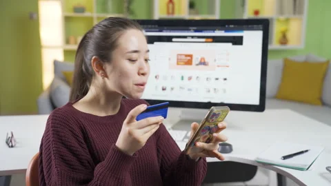 Young woman ordering from e-commerce shopping is completed and rejoicing. Stock Footage 235519909