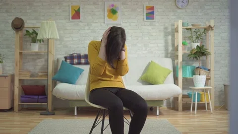 Young woman panic attack, covers her head with her hands Stock Footage 104510798