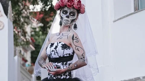 A young woman with a pattern on her face and neck in the style of the Goddess of Stock Footage 228766548