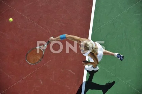 Young woman play tennis Stock Photos