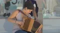 Young woman playing an accordion in Porto 4k or 4k+ Resolution