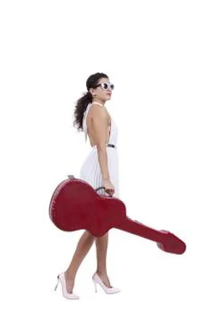 Young woman posing with guitar case Stock Photos