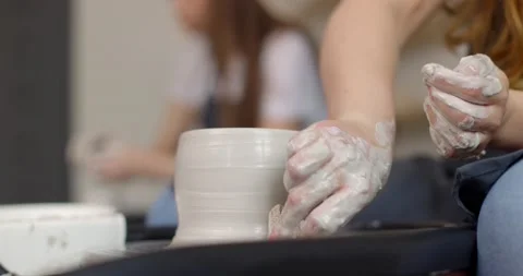 Young woman in pottery studio using pottery wheel, handmade ceramics, creative Stock-Footage 155201751