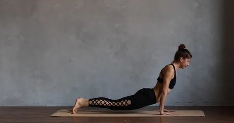 Young woman practice stretch exercise at yoga class Stock-Footage 127741366