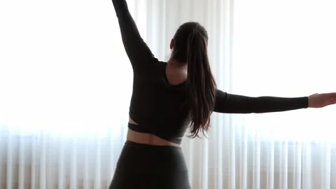 Young woman practicing pilates at studio Stock Footage 149784336