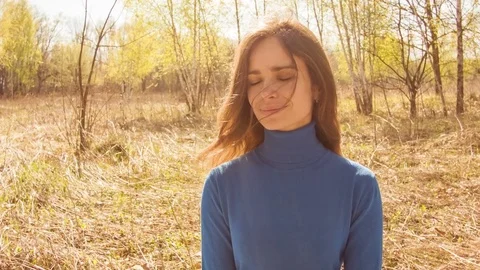 Young woman practicing yoga in a spring forest. Stock-Footage 80562212