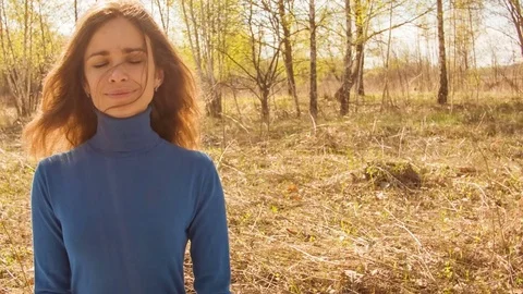 Young woman practicing yoga in a spring forest. 스톡 동영상 80562483
