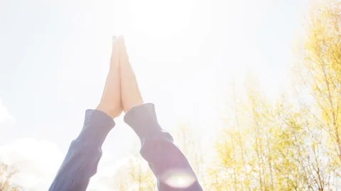 Young woman practicing yoga in a spring forest. 動画素材 80572469