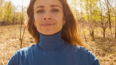 Young woman practicing yoga in a spring forest. Stock Footage